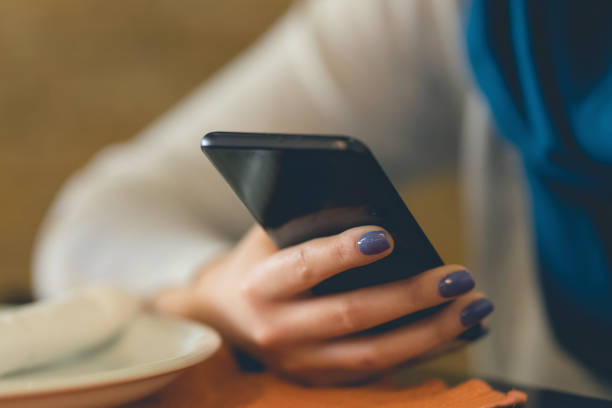 istock Woman Holding Mobile Phone 1131690278
