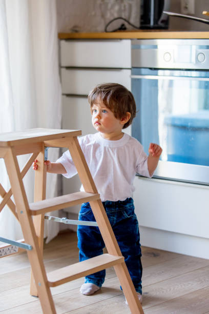 istock Little toddler boy stay at kitchen 1131692985