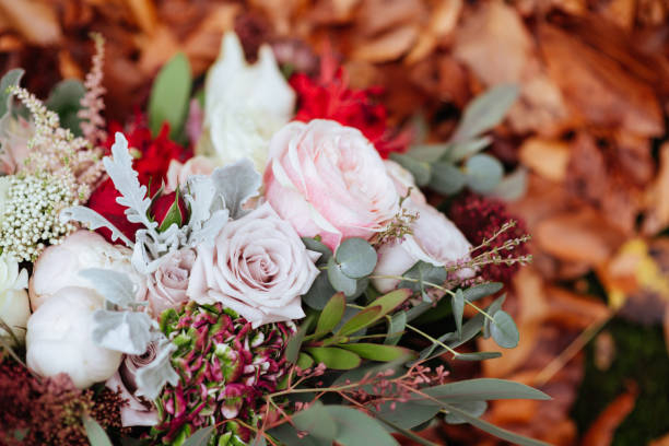 istock autumnal bridal bouquet. bride holding wedding bouquet 1131697885