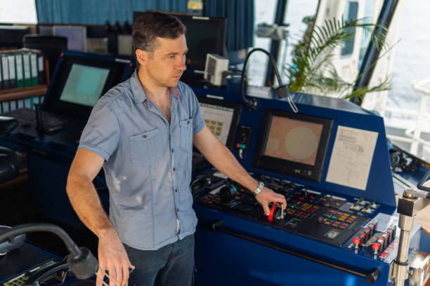 istock Marine navigational officer during navigational watch on Bridge 1131701177