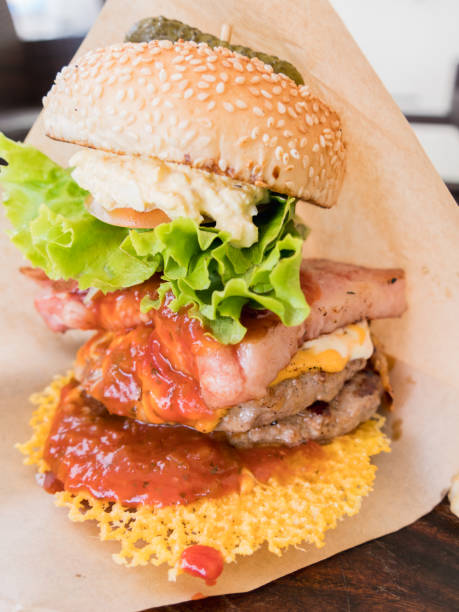 istock A hamburger with a volume with bacon and meat in between. 1131701863