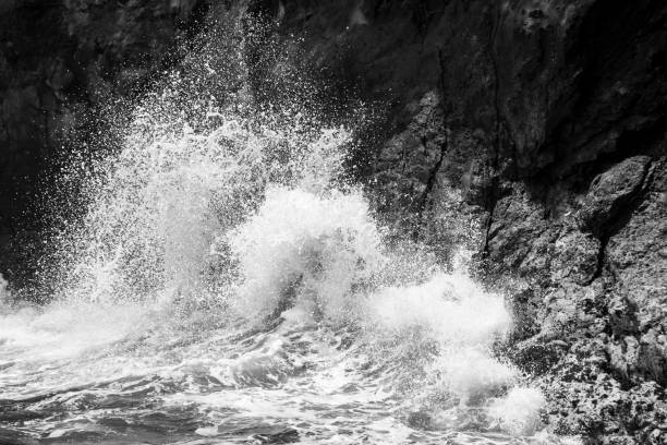 istock Waves Crashing on Volcanic Rock of Hawaii 1131703783