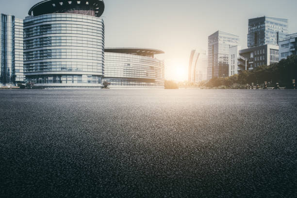Asphalt pavement and modern architecture of city highway