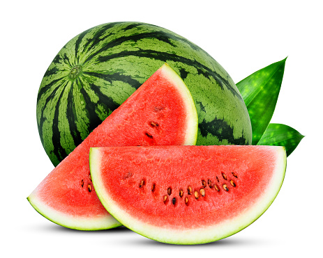 whole and slices watermelon with green leaves isolated on white background