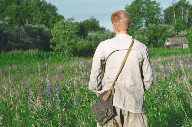 istock man in uniform standing in the field 1131710134