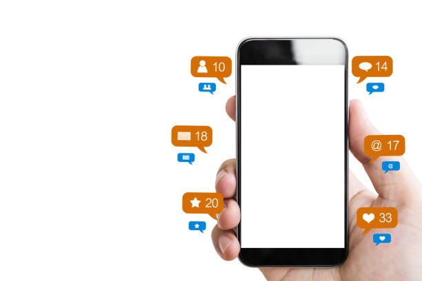 istock Hand holding mobile smart phone, blank empty screen and online social networking notification icons, isolated on white background 1131714293