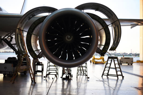 istock Jet engine with fan cowls and thrust reverser cowls open for maintenance 1131715267