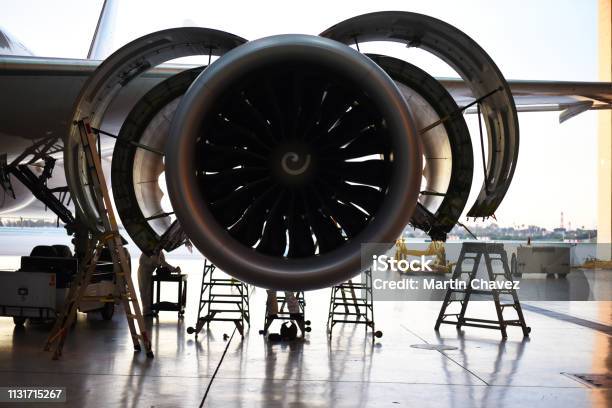 Jet Engine With Fan Cowls And Thrust Reverser Cowls Open For Maintenance Stock Photo - Download Image Now