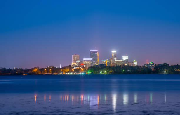 istock Minneapolis skyline and park lake 1131717837