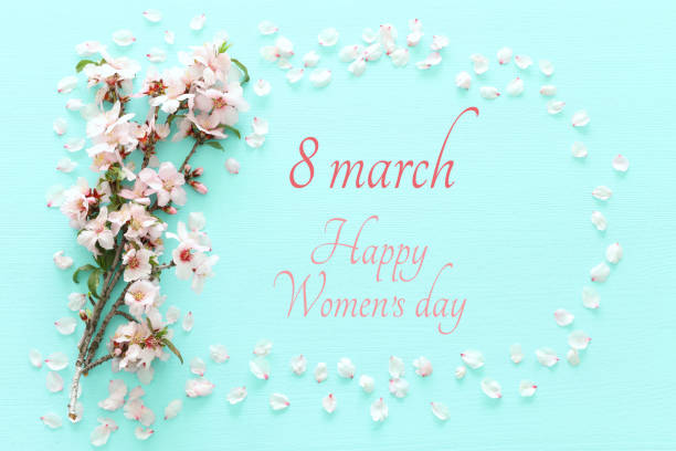 istock International women day concept. Cherry tree and date text. Top view image 1131718827