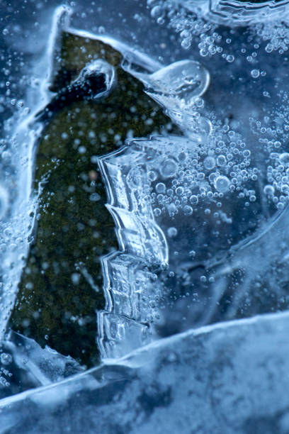 istock Abstract patterns and shapes in ice of the Hockanum River. 1131723039