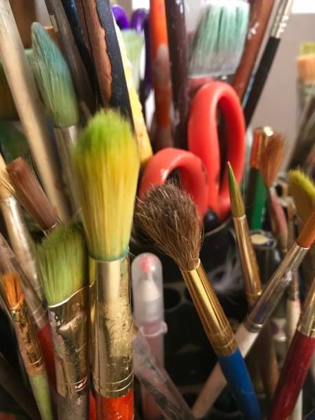 istock Artists studio art supplies painting papers brushes 1131723409