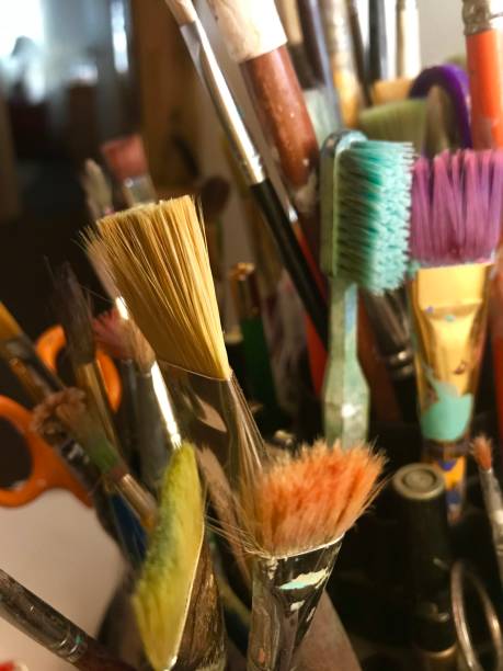 istock Artists studio art supplies painting papers brushes 1131723418