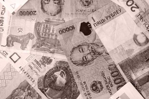 istock Different countries money background close up. Brown color toned 1131725442