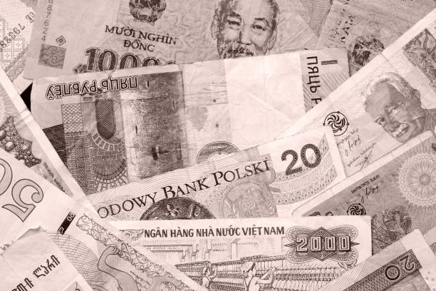 istock Different countries money background close up. Brown color toned 1131725458