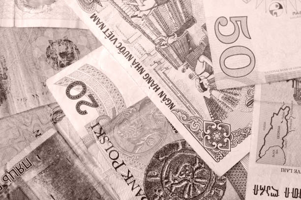 istock Different countries money background close up. Brown color toned 1131725464