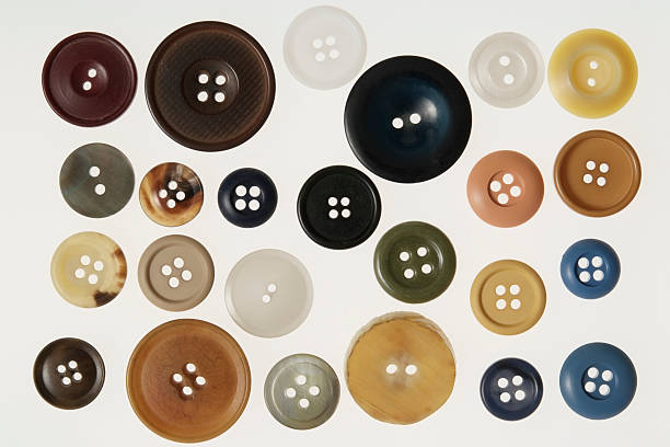 Colored old button collection isolated on white background.