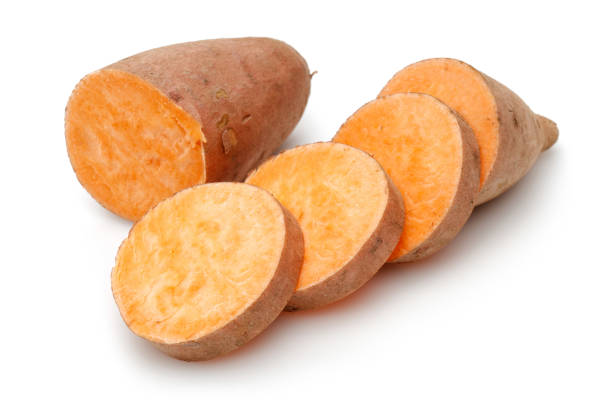 istock Sweet potato with slices isolated on white 1131726568