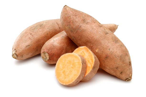 istock Sweet potato with slices isolated on white 1131727183