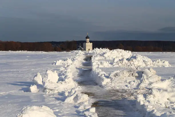 Beautiful photo of the winter landscape of the white Christian Church near Bogolyubovo