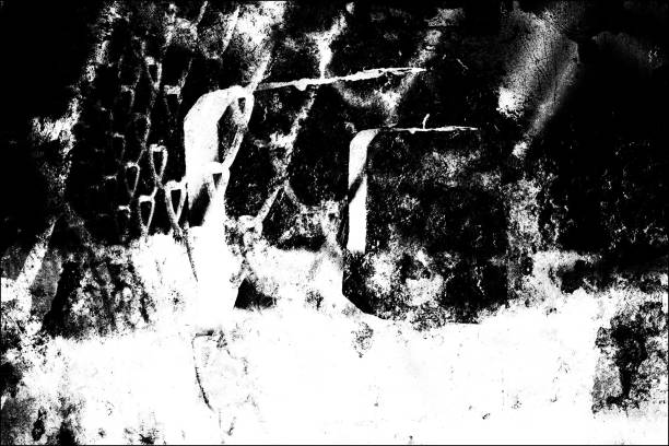 istock Texture of scratches, cracks, chips. Monochrome abstract grunge background. Black and white pattern of old surface. Template for texturing posters, business cards, labels, icons 1131737101