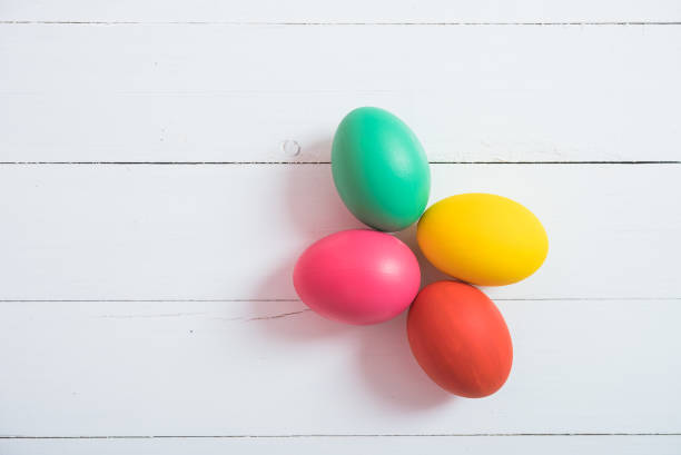 istock Colorful easter eggs clean on wooden background 1131738164