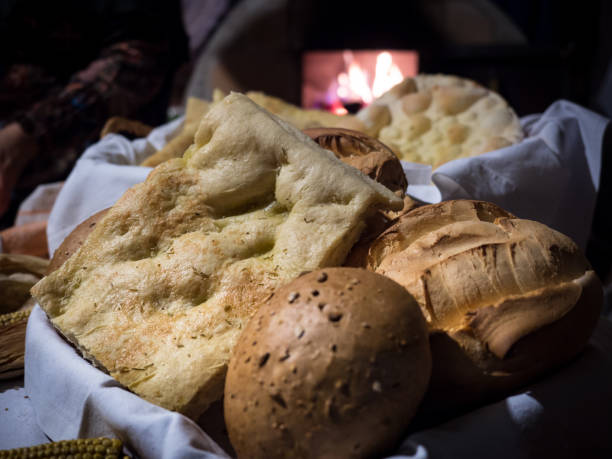 istock Traditional bread baked in an old wood-burning oven. 1131743536