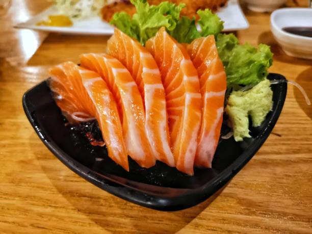 istock Sashimi salmon set or raw fish, Traditional Japanese cuisine 1131745437