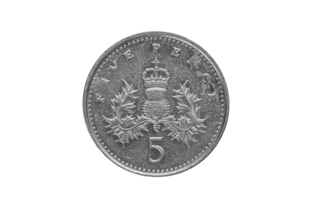 istock Five british pennies coin isolated on white background - clipping paths 1131746719