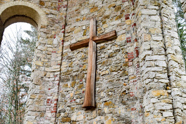 Cross painted on brick wall background