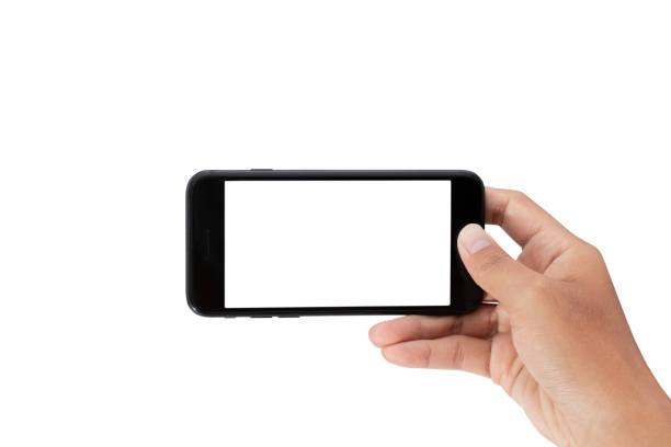 istock hand holding smartphone isolated on white background - clipping paths 1131749548