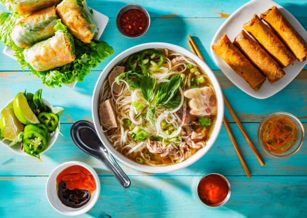 istock vietnamese beef pho bo soup in bowl on table top with spring rolls and appetizers 1131752155