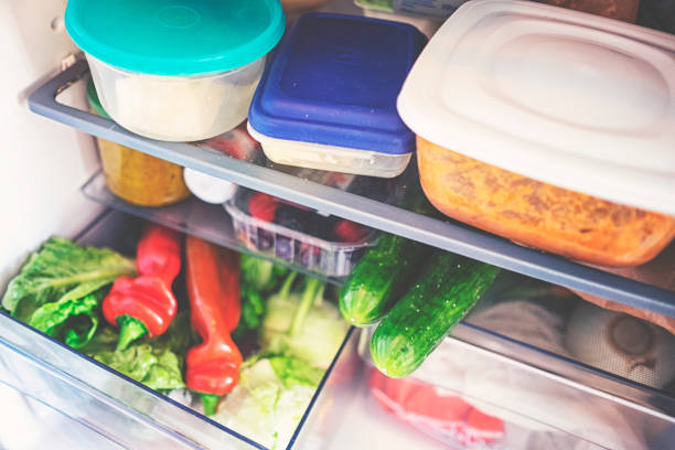 istock Fresh vegetables for storage in the fridge in a plastic box 1131752996