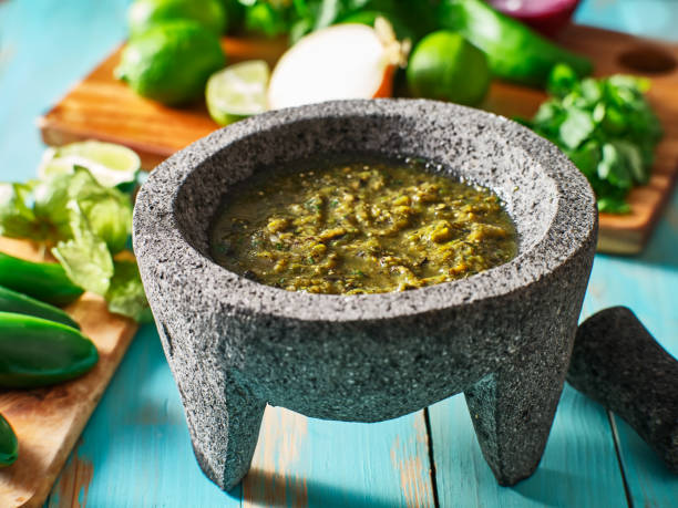 istock mexican salsa verde in traditional stone molcajete 1131753164