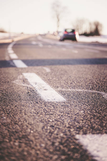 istock Rough asphalt on a country road in Austria 1131754419