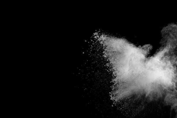 istock White powder explosion isolated on black background. White dust particles splash.Color Holi Festival. 1131754470
