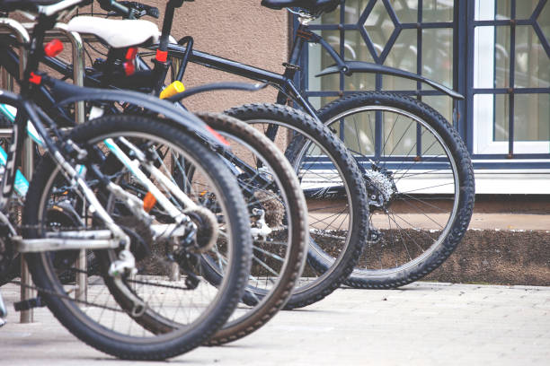 istock parking for bicycles in the city, toned 1131758432