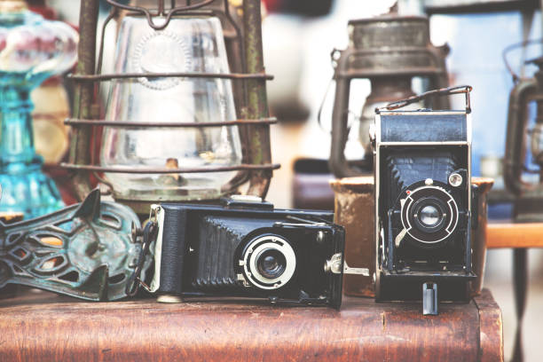 istock very old black retro camera, retro toned 1131758508