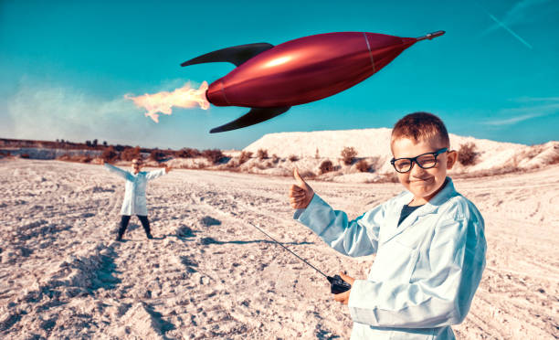 istock Remote controlled rocket launch in desert gets thumbs up from child scientist 1131758992