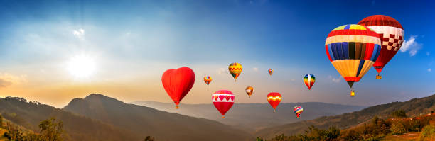 istock Colorful hot air balloon fly over mountain view 3 1131767366