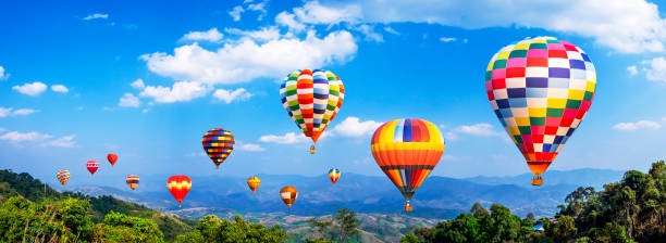istock Colorful hot air balloon fly over mountain view 2 1131767371