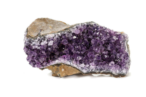 istock Amethyst Crystal Druse  macro mineral on white background 1131768229