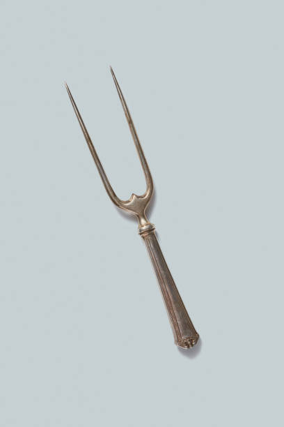 istock Vintage meat fork isolated on a white background, copy space. 1131768908