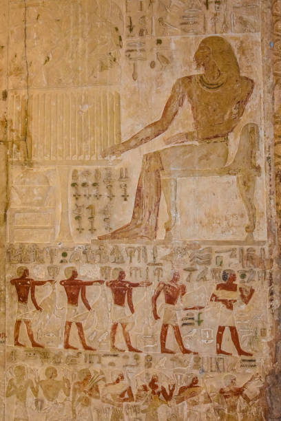 istock Egyptian ancient hieroglyphs on the stone wall 1131771514