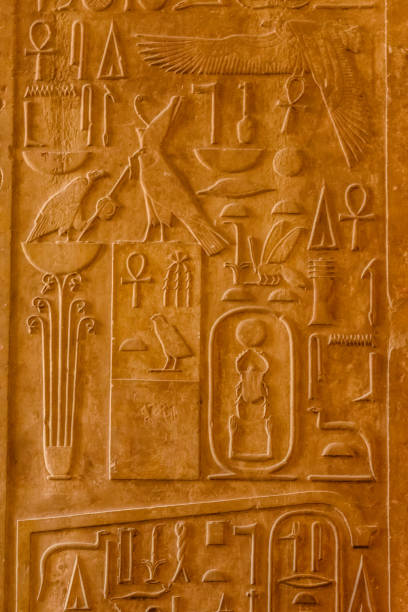 istock Egyptian ancient hieroglyphs on the stone wall 1131771515