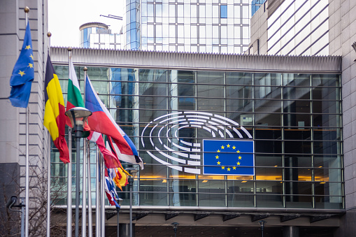 February 21, 2019. Brussels, Belgium. EU parliament. European countries flags on European parliament building facade,