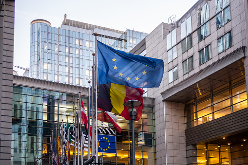 February 21, 2019. Brussels, Belgium. EU parliament. European countries flags on European parliament building, in the evening