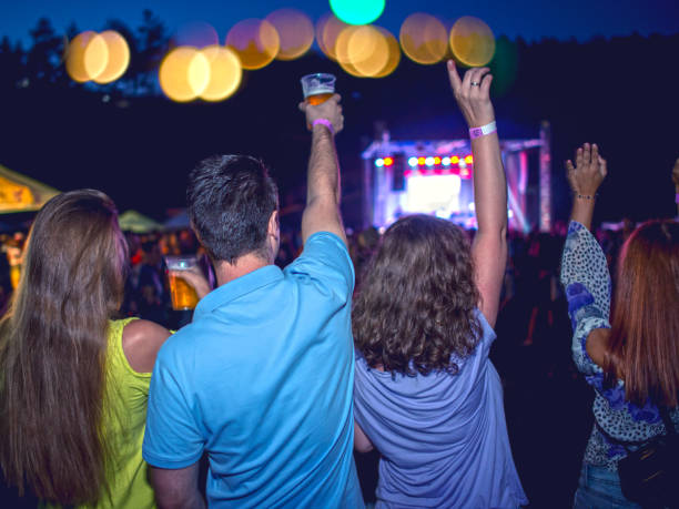 istock Friends enjoying a concert 1131775558