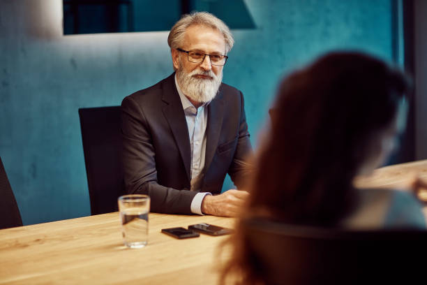 istock handsome caucasian senior CEO at a meeting 1131775658