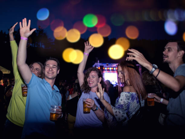 istock Friends enjoying a concert 1131776033